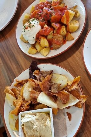 Patatas bravas & Hummus with vegetable crisps at El Miracle in Valencia