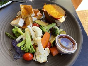 Tofu with sweet potato and steamed veggies at Nancy's Sky Garden in Austin