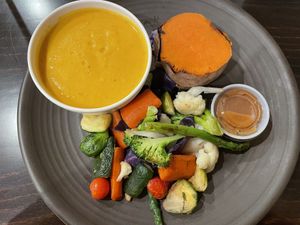 Carrot soup. Baked sweet potato and warm vegetables. Delicious   #Veganuary at Nancy's Sky Garden in Austin