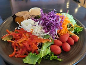 Signature plate. No protein or fruit. Baked sweet potato. at Nancy's Sky Garden in Austin