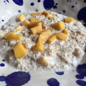 Vegan oatmeal porridge on coconut mylk with mango and cinnamon at The Sky Over Dalat in Da Lat