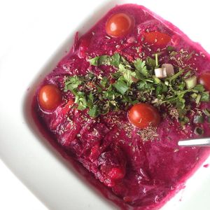 Raw Vegan Borsch. Beetroot soup with carrot, red cabbage and cherry tomatoes at The Sky Over Dalat in Da Lat