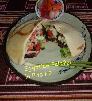 Egyptian Falafel in Pita
Fried falafel laid over salad and tahini Sauce.
 at The Pharaoh's Restaurant in Vientiane