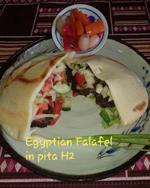 Egyptian Falafel in Pita
Fried falafel laid over salad and tahini Sauce.
 at The Pharaoh's Restaurant in Vientiane