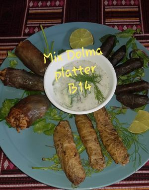 VEGAN Mix Dolma platter
Cabbage, Grape leaves and Eggplant dolma, serve with Egyptian Green Salad at The Pharaoh's Restaurant in Vientiane