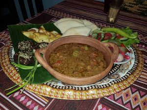 Mix Fava Beans & Falafel
Fava beans cooked with salad & tahini plus pieces of Egyptian falafel, serve with pita, pickles, and Egyptian green salad
 
 at The Pharaoh's Restaurant in Vientiane