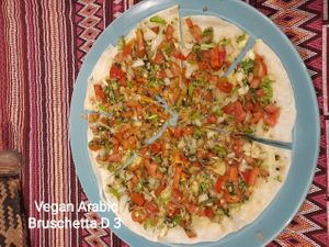 Arabic Bruschetta
Flat pita topped with onions, tomato, parsley and SUMAC powder.
 at The Pharaoh's Restaurant in Vientiane
