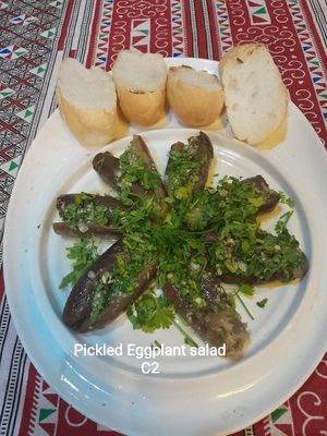          C2. Pickled Eggplant Salad 
           Eggplant Stuffed with green chili marinated in special vinegar garlic sauce.
 at The Pharaoh's Restaurant in Vientiane