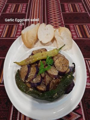 Garlic Eggplant Sala 
                    Slices of fried Eggplant soaked in special vinegar garlic sauce.
 at The Pharaoh's Restaurant in Vientiane
