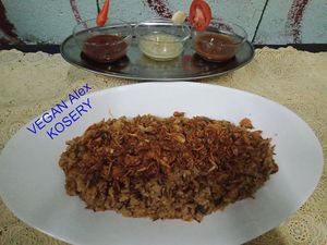 The Alexandrian KOSHERY dish will be served as follows:
B) Vegetarian----------55,000 KIP
Egyptian Basmati rice, yellow lentils, vermicelli mixed together, topped with a spiced tom at The Pharaoh's Restaurant in Vientiane