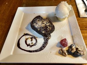 Schokokuchen mit heisser Schokososse und Fichtensorbet at Berggasthaus Heimeli in Langwies