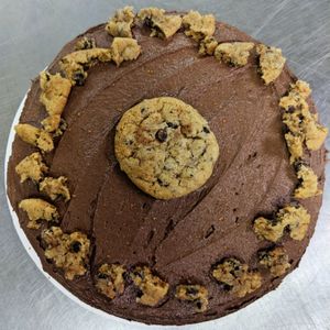 Custom cake order. Chocolate almond maple cinnamon cake filled with banana cinna-munch chocolatechip cookies! at The Baked Vegan Bakery in Lake Park