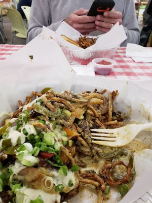 Philly cheese stake fries with jalapenos! at Blue Sage Vegan Bistro in Little Rock