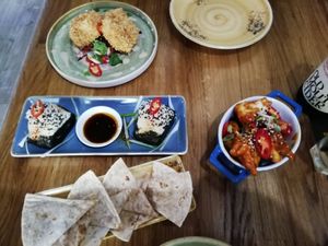 "chicken" onigiri, Korean cauli wings, satay tofu, roti at Veggie Republic in Liverpool