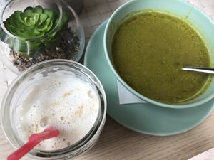 Spinach/espinafre soup of the day/sopa de dia e café gelado com leite de soja/ iced coffee with milk at Café Garrett by Ohana in Lisbon