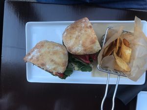 Smashed Quinoa Cake with House Potato Chips at Boca Bistro in Saratoga Springs