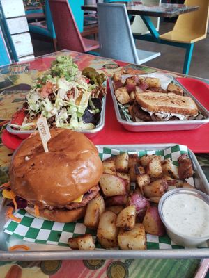 Beef Nachos (top left) and Barbie-Q burger on bottom at Tiki Loco in Dallas