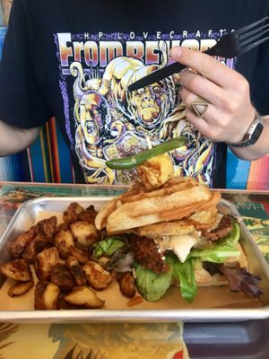 Egg, sausage, gravy waffle sandwich  at Tiki Loco in Dallas