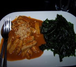 peanut sauce chicken with crispy spinach at ChuChai in Montreal