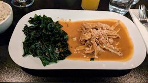 PHRA RAM GAI (vegan chicken and fried spinach) with vermicelli on the side at ChuChai in Montreal