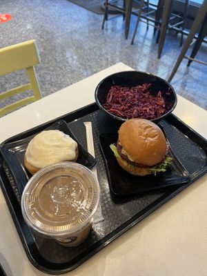 Smoothie, cinnamon bun, coleslaw and burger 🍔   at Copper Branch in Ottawa