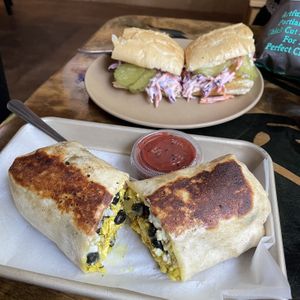 Breakfast burrito & bbq jackfruit sandwich w/ chips  at Cafe Single Fin in Pensacola