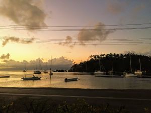 Beautiful sunset view over the harbor and Nawi island right outside. at Sea Lovers in Savusavu