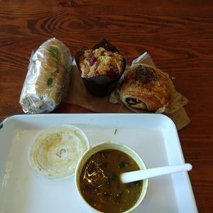 Red Lentil Curry with adzuki beans and spinach - super delicious!! Above that is the tofu submarine sandwich, sweet muffin, savory croissant at Ely's To Go in Boardman