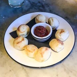 Vegan Dough-balls served with Tomato & Harissa Dip  at Pizza Express in Stratford-upon-avon