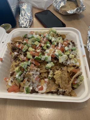 My husband isn’t the biggest nacho fan, but he dug into this with me. Nachos Supreme at Healthy Substance - Garfield Ridge in Chicago