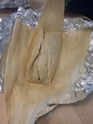 Not pretty the way I took it, but the best damn tamale of my life! Poblano pepper tamale at Healthy Substance - Garfield Ridge in Chicago