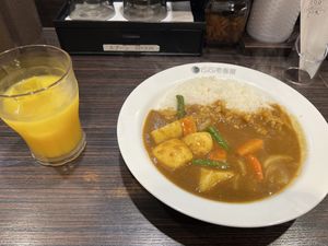 Vegetable curry and orange juice   at Coco ichibanya - Shinjuku Station in Tokyo