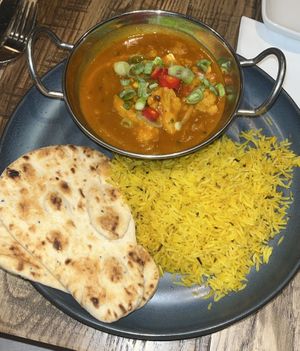Gobi dhansak curry with rice and naan  at The Village Inn in Southampton