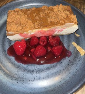 Biscoff cheesecake with berries  at The Village Inn in Southampton