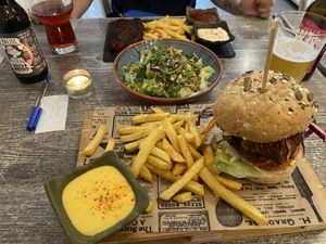 Seitan bbq burger and seitan steak in the back at Balance Bowl in Gzira