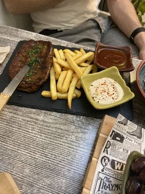 Seitan steak and chips with dips  at Balance Bowl in Gzira