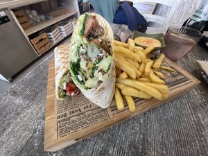 Falafel wrap with fries and hummus at Balance Bowl in Gzira