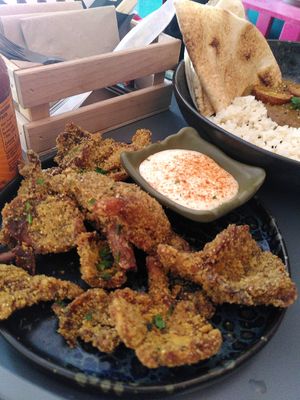 Calamaris left, Madras curry right at Balance Bowl in Gzira