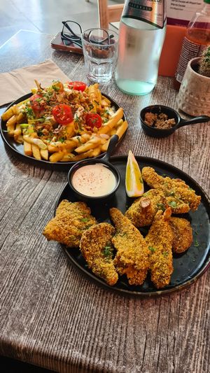 The calamari and loaded fries are both fantastic! at Balance Bowl in Gzira