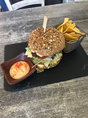 Nutty burger with cheese and nachos  at Balance Bowl in Gzira