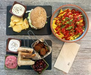 Burger with protein chunks, Mediterranean Platter and Fiery Nachos! at Balance Bowl in Gzira