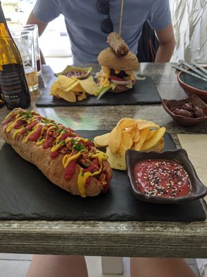 Look at that sausage at the top of my burger at Balance Bowl in Gzira