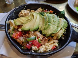 Greek skillet made vegan with scrambled tofu instead of egg. at Herms Inn in Logan