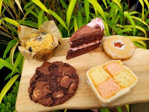 Blueberry and Almond Muffin, Turkish Delight Sponge, Jammy Dodger, Double Chocolate Cookie & Battenberg. at Rachel's Vegan Cakes in Wrexham