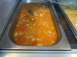 Vegan white beans with carrots and bell peppers.  at Salamanca Magenta Cafe & Bar in Salamanca