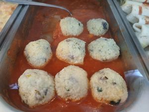 Light grain balls in tomato sauce.  at Salamanca Magenta Cafe & Bar in Salamanca