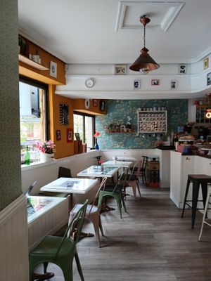 Quaint dining room with locals stopping in to chat, have tapas, and get take out.  at Salamanca Magenta Cafe & Bar in Salamanca