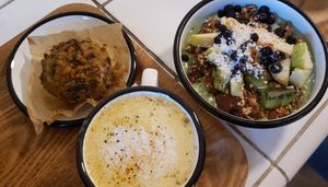 Golden latte, Greek muffin and matcha bowl at Wild & The Moon - Saint Honoré in Paris