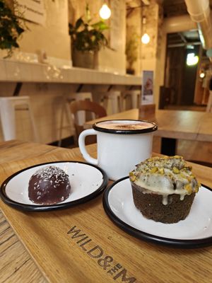 Wild bounty, pistachio lovers cupcake, hot chocolate chaga. at Wild & The Moon - Saint Honoré in Paris