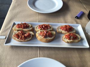 Garlic break made vegan and comes with tomato’s  at Broadway in Kos